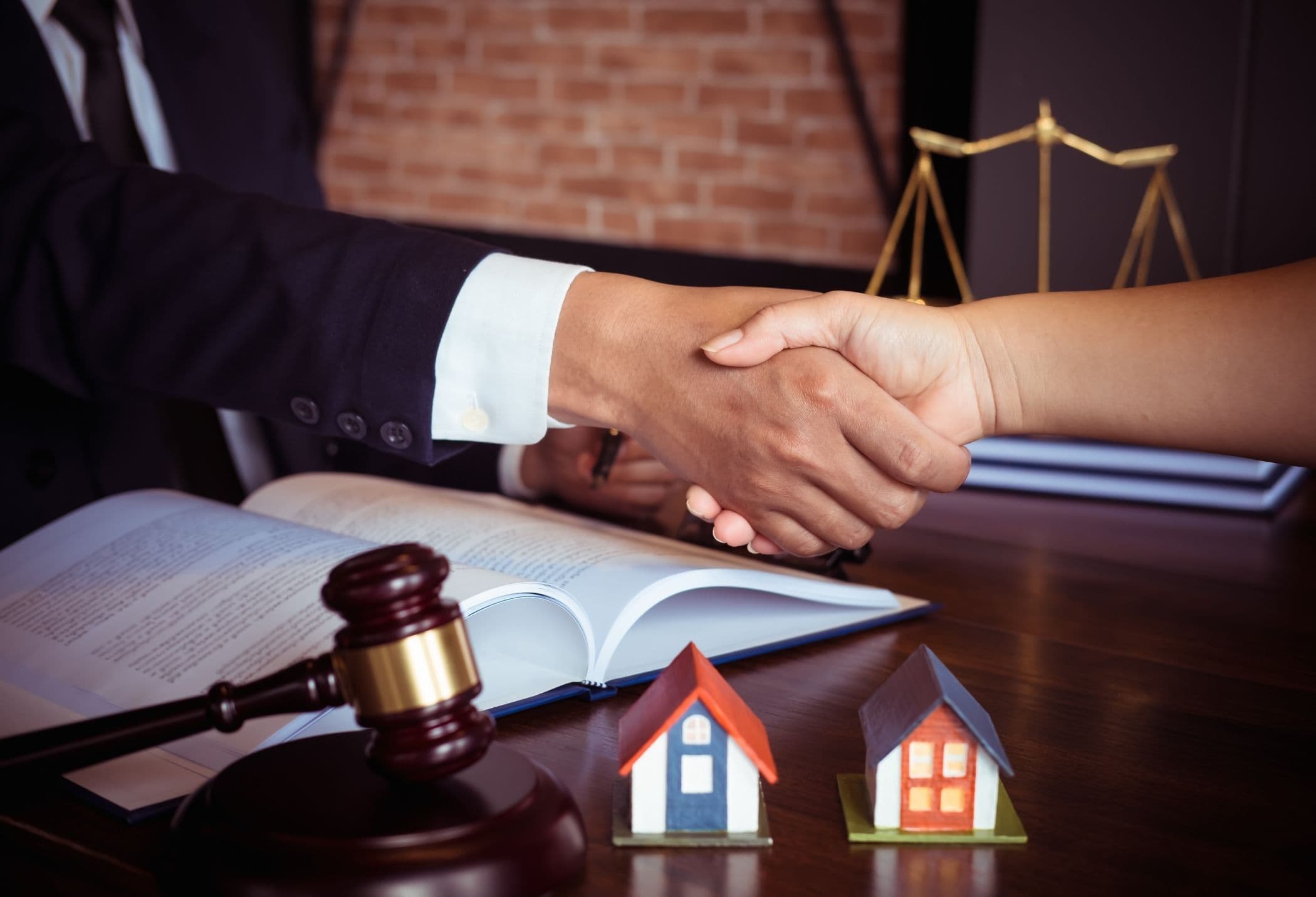 Attorney reviewing succession documents at a desk